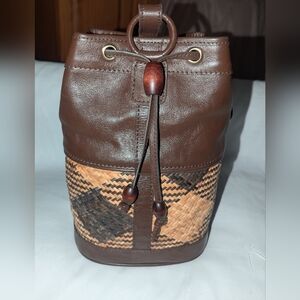 The Sak Brown Weave and Leather Backpack.